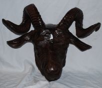 A very large heavyweight wall hanging cast metal model of a ram sheep`s head.
