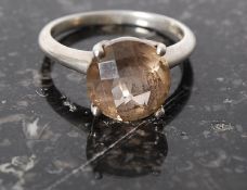 Sterling silver dress ring with large smokey quartz stamped 925 Size V.
