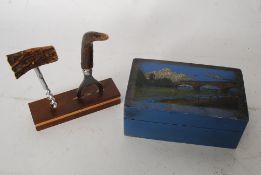 Early hand painted box depicting a steam train crossing a bridge together with a horn handled bar