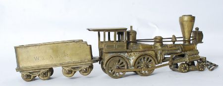 A large decorative solid brass heavy American train and tender stamped W & ARR & Texas respectively