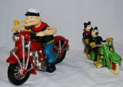 Two vintage style cast metal figures, one of Popeye, the other of Mickey & Minnie Mouse, both