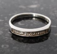 Silver channel set ring stamped 925 with s dot hallmark