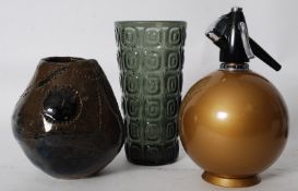 A retro Bartlett soda syphon, retro vase along with a studio pottery vase