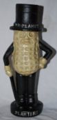 A large cast metal `Mr Peanut` advertising figurine, with hand painted decoration.