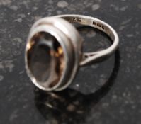 Sterling silver dress ring with large smokey quartz stone and stylized mount, stamped W.G