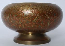 A large 20th century Indian brass bowl with interpainted red/orange fire design paintwork to