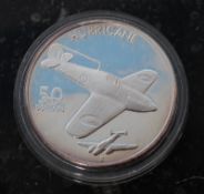 A Republic of Marshall islands 1991 Hurricane $50 silver proof coin.