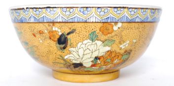 A 20th century hand painted Chinese oriental bowl with character marks to base. 25cm diameter, 11cm