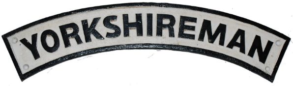 RAILWAY: A cast metal railway locomotive sign for the `Yorkshireman`. Curved metal base with hand