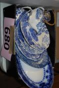 A collection of blue and white china plates and gravy boats