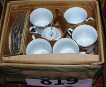 A boxed unused tea service by Crown Ming