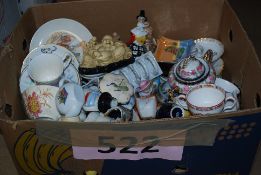 A box of mixed china to include Buddha, Toast rack, Cups, jugs etc.