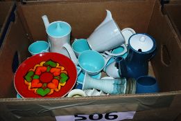 A Poole pottery tea and coffee service along with a retro plaque and plate