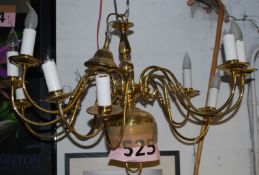 A 12 branch brass chandelier.