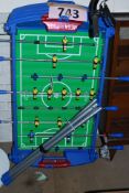 A vintage table football/ fussball table complete with balls and legs