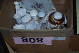 A mixed lot to include a Coalport figurine, silver plate figurine, salt and pepper shakers,