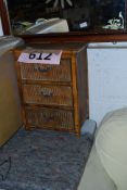 A bamboo miniature 3 drawer chest along with two tavern style advertising mirrors, one being for