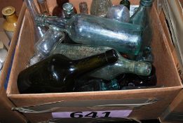 A large collection of antique glass bottles, to include torpedo style and others.