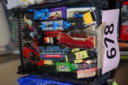 A box of mixed die cast toys