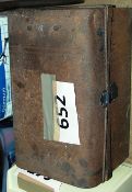 A vintage tin trunk with catch lock together with a small cabinet and a carpet cleaner