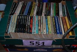 A large quantity of vintage books to include horror themed, sci fi and others. x2 boxes.