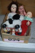 A mixed box to include 3 dolls, a Merrythought stuffed dog on wheels and other items.