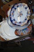 A mixed lot of plates to include a 19th century willow pattern meat plate and others.