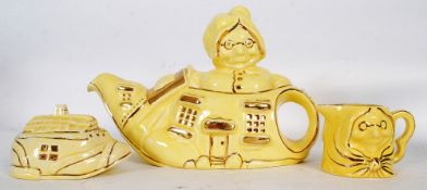 A 1940`s Old Woman in the Shoe teapot with creamer and sugar bowl by Lingly RD 825539c