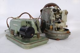 A vintage Fennel Kassel optical surveyors line leveler telescope in original steel case along with