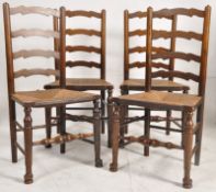 A set of 5 (4 shown) good quality 1920`s country oak ladderback dining chairs. The turned legs