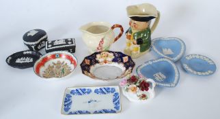 A large collection of china items to include a Carltonware jug, Wedgwood jasperware, Toby Jug,