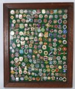 A collection of approx 200 vintage 20th century enamel Bowling Club badges, mounted and displayed