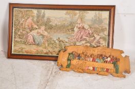 A carved last supper wall plaque together with a large tapestry wall hanging in wooden mahogany