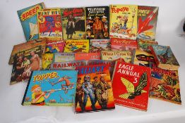A collection of vintage childrens annuals to include Valiant, Eagle Annual 3,  Huckleberry Hound,