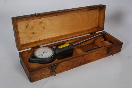 A vintage John Bull bore pressure testing gauge, with makers mark to dial and reverse, in original