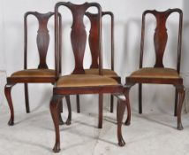 A set of 4 Edwardian mahogany Queen Anne dining chairs. Cabriole legs with pad feet supporting drop