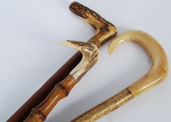 3 vintage walking sticks / canes, each with horn handles, on with bamboo shaft, the other malacca