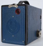 A vintage box brownie No. 2 camera with unusual blue finish, having a faux snake skin case.