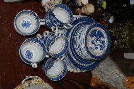 A Booths part service with willow pattern to include cups, saucers, side plates etc.