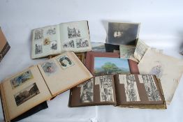 A mixed lot of ephemera to include contemporary oil paintings, vintage scrapbooks and a postcard /
