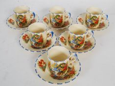 A 1930`s Coronet Ware Parrot & Co set of 6 cups and saucers in a decorative and colourful pattern,