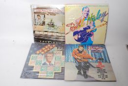 RECORDS: Four NM compilation albums to include Buddy Holly Greatest Hits, Gene Vincent Greatest