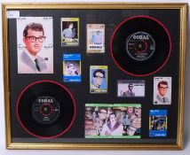 BUDDY HOLLY: A framed Buddy Holly display piece, consisting of original advertising phone cards