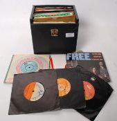 Record box containing singles from the early 70's to include The Who, Free, Desmond Decker and other