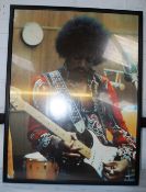 A vintage framed and glazed poster of Jimi Hendrix