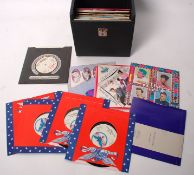 A selection of 45 rpm vinyl record singles to include The Cues Destination 2165 on Capitol Promo,