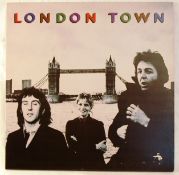 Records: Wings London Town matrix 975 - 2 / 976-2 mastered by Nigel W etched in run off to side 1.