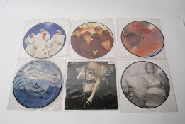 7 picture singles to include The Beatles, Madonna, Logic System, East 17 x 2 along with 2 Crusin
