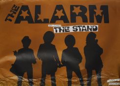 Music Memorabilia. An unframed large 'Alarm'  'The Stand' music album poster depicting silhouette
