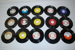 Fifteen 7" Vinyl Reggae singles from the 1960's, various artists and labels. See illustrated.